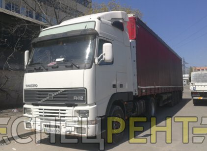 Грузоперевозки тентованой фурой Volvo FH12